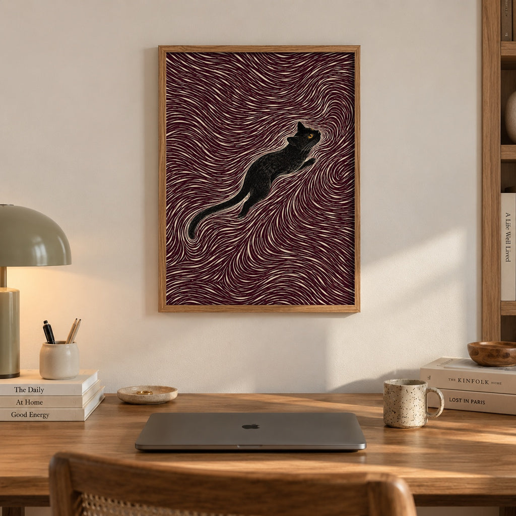 A sleek black cat stretches gracefully through a hypnotic swirl of maroon and cream lines — artwork print detail