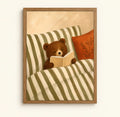 Teddy bear reading a book in bed under a green striped duvet, framed painted bear wall art print