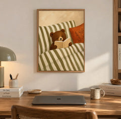 Teddy bear reading poster hanging above a wooden desk