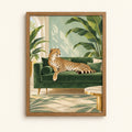 Cheetah lounging on a green velvet sofa in a tropical room — jungle animal wall art print