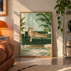 Cheetah on velvet sofa poster displayed in a room