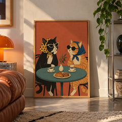 Cafe cats in headscarves poster displayed in a room