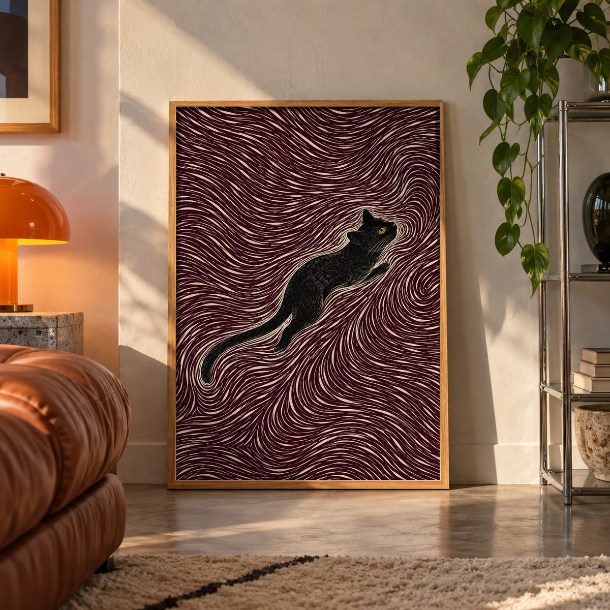 Black cat maroon swirl poster displayed in a room
