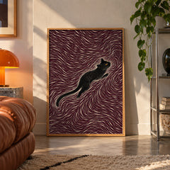 Black cat maroon swirl poster displayed in a room