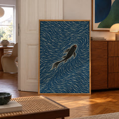 A lone black koi glides through hypnotic swirls of deep indigo and cream — poster displayed in a styled room