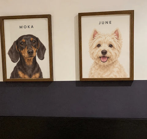 Portraits of Moka the dachshund and June the westie on a customer's wall
