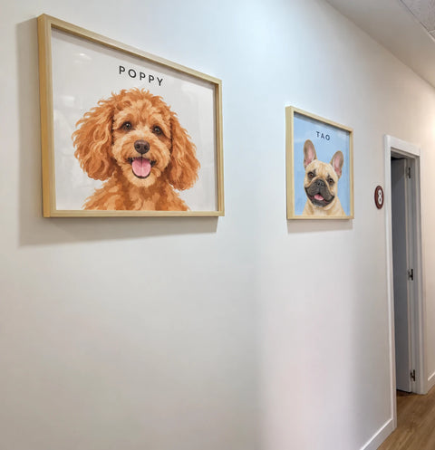 Portraits of Poppy and Tao hanging in a customer's hallway
