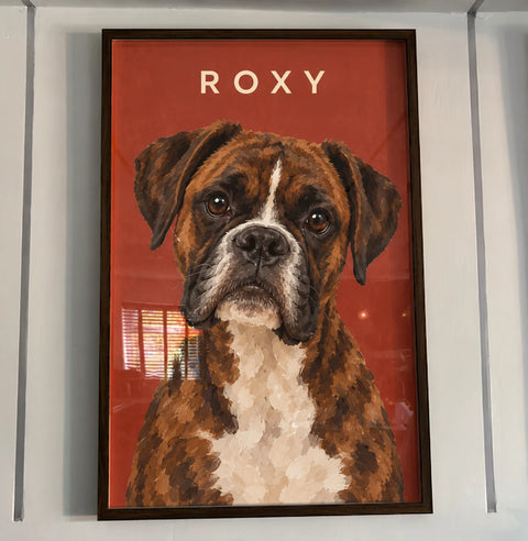 Customer's portrait of Roxy, a boxer, on a red background